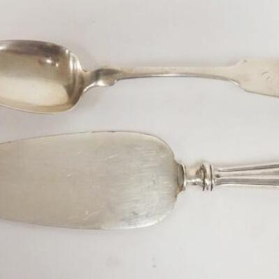 1073	2 PIECE COIN SILVER TABLESPOON SIGNED J WALLIN W/HALL MARKS & A PASTRY SERVER W/A STERLING SILVER HANDLE LONGEST IS 10 1/4 IN, 1.8 TOZ
