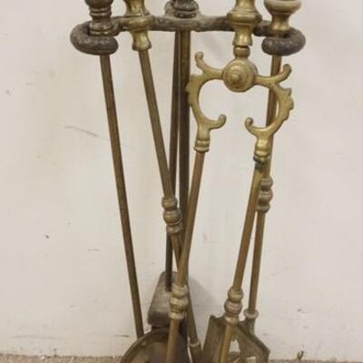 1313	SET OF BRASS FIREPLACE TOOLS IN CAST IRON HOLDER
