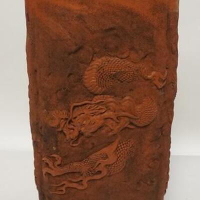 1251	ASIAN TERRA COTTA VESSEL, HAS OPENINGS ON 2 SIDES & RELIEF DRAGONS, 18 IN HIGH
