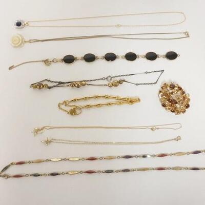 1201	JEWELRY LOT INCLUDING 6 NECKLACES ONE MISSING STONE, 2 BRACELETS ONE CLASP BROKEN AND AMBER PIN
