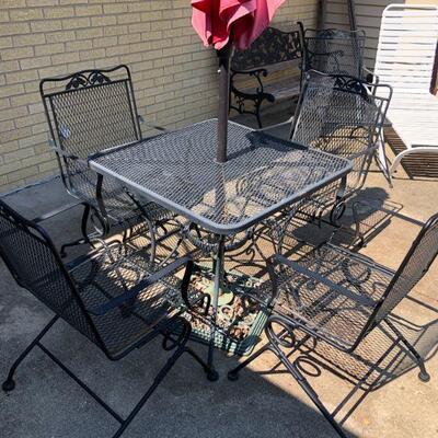 Wrought Iron Patio Table w/4 Chairs & Umbrella w/Cast Iron Base $260.00
~Table: 29