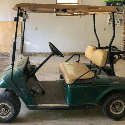 2002 E-Z-GO TXT Golf Cart ~ $2,500.00 
~ 2WD  
~ Gas Powered
~ Headlights/Tail lights
~ Tan Canopy 
~ Bag Holder
~ Hinged Windshield
~...