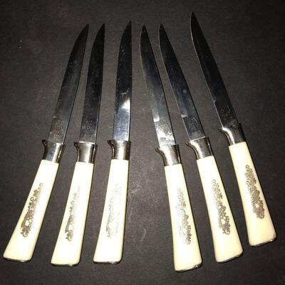 silvery embossed steak knives