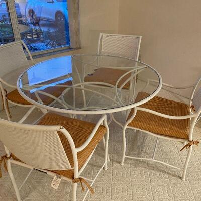 White metal patio table and chairs