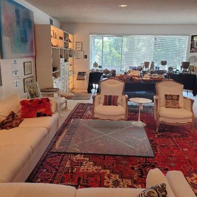 Persian hand knotted Heriz carpet, Mies van der Rohe style Barcelona table, mid-century sectional 