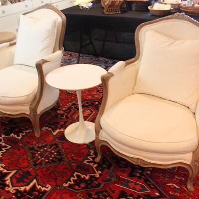 Vintage armchairs and tulip table