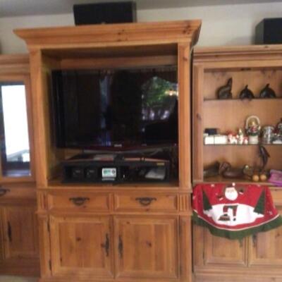 Entertainment center has door panels that can be reattached. $35. Beautiful furniture, put in your garage!!!