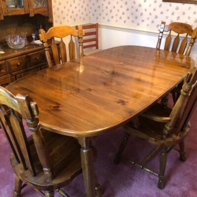 Small Dining table w/3 chairs, 1 captain’s chair, leaf, pads
$140