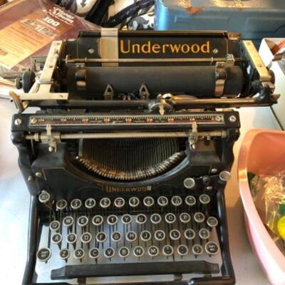 Antique Underwood Typewriter w/leather cover
$80