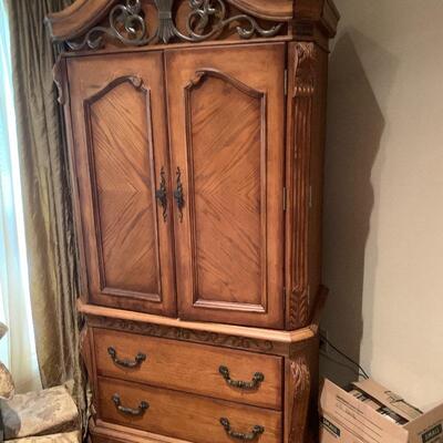 Armoire with double hinged doors