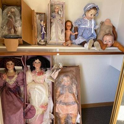 2605	

Porcelain Dolls and Statues
2) 36â€ tall 1) 24â€ tall Other Dolls and statues range in sizes