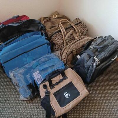 2854	

Three Duffel Bags, One Laptop Bag, One UPS Bag And More
Three Duffel Bags, One Laptop Bag, One UPS Bag And More