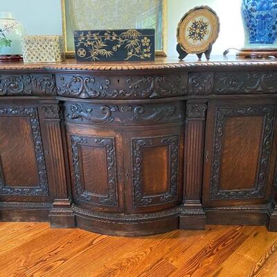 Victorian Carved Cabinet with whimsical faces