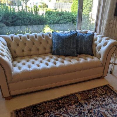 Faux leather Chesterfield loveseat