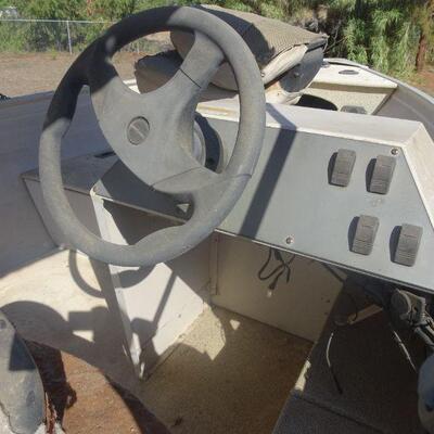 2000 Crestliner 14 Fishing Boat with Johnson Motor. (minimum $1,500)