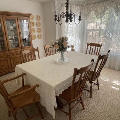 Dining table with 6 chairs $ 400 
Matching hutch $400
