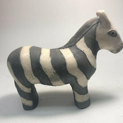 "https://www.ebay.com/itm/114918154991	"	ME7021 South African Raku Pottery Zebra Figurine (small)	BIN
