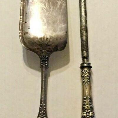 "https://www.ebay.com/itm/124835396052	"	ME1007 STERLING SILVER TIFFANY & CO CRUMB KNIFE & KNIFE SHARPENER	BIN

