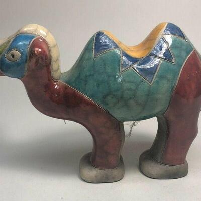 https://www.ebay.com/itm/114918154997	ME7007 South African Raku Pottery Camel Figurine (white, red, and blue head	BIN
