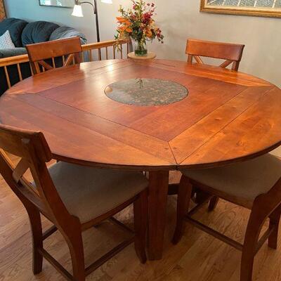 Verona Rustic 9 pc (8 Chairs & Table) dining room set with Folding Leaves on each side and Marble Lazy Susan centerpiece. Retail Info:...