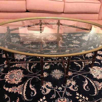 brass, glass and faux bamboo coffee table $275
45 X 31 X 16