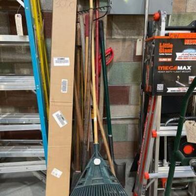 #3070 â€¢ Rake, Shovels , Push Brume, Weed Wacker and Attachable Tree Saw. surrounding items not included. 