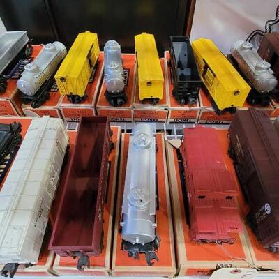 #1906 â€¢ 18 Lionel Railcars with Boxes