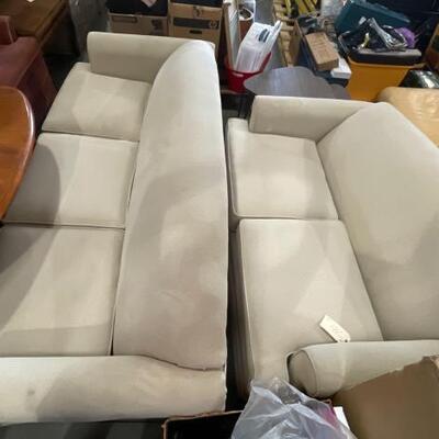 782	

2 Creme Colored Sofas
Length Measures 58â€-77â€