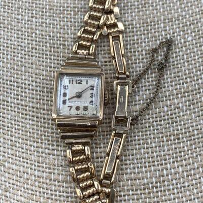 18k Gold Ladiesâ€™ Wrist Watch with 14k Gold
Bracelet Band 17.45g Total Weight