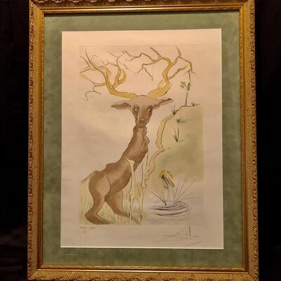 Salvador Dali. The Stag Reflected in the Water.
Signed Lithograph. 1974. #32 of 62. 22x15.5. 35x28 framed. No COA  Available.