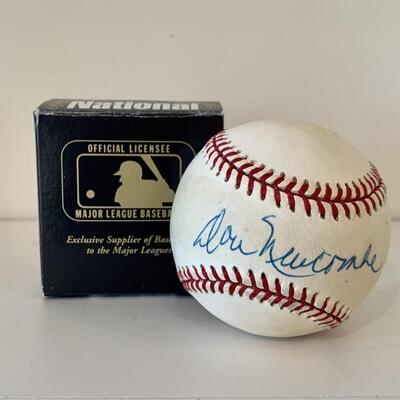 Signed Ball by Dodger's Don Newcombe 1st Black to start a World Series game. Newcombe was the first pitcher to win the Rookie of the...