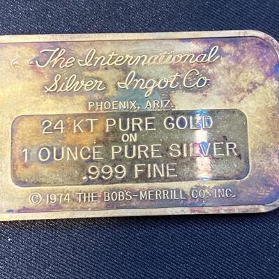 1 Troy ounce Raggedy Ann & Andy .999 Fine Silver
Bar dipped in 24k Gold