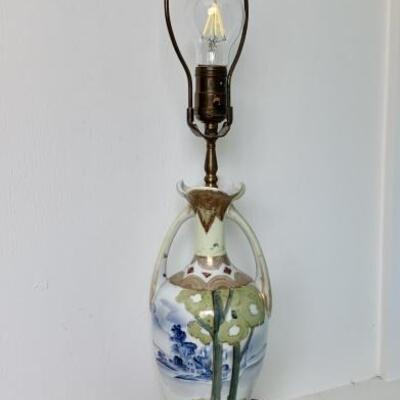 Vintage Urn Lamp with Blue & White Scene behind
Raised Treed Forrest Detail