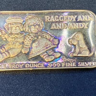 1 Troy ounce Raggedy Ann & Andy .999 Fine Silver
Bar dipped in 24k Gold