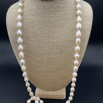 Single Strand Hand Knotted Baroque Pearl Necklace
with 14 Karat Gold Clasp