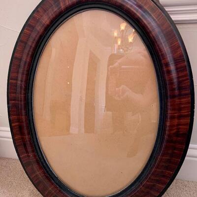 Vintage oval frame with convex glass