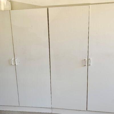 Three storage cabinets