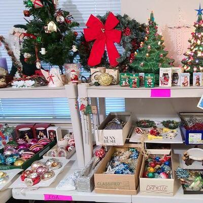The Christmas Tree on the right with the birds and berries has been pulled by the family and is no longer available for the sale.