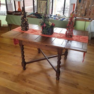 Beautiful antique table capable of 2 size tops.
