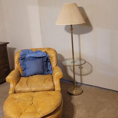 nice chair and ottoman, floor lamp also