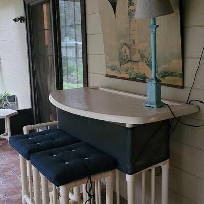bar out on the lanai, sold as a set with the two stools
