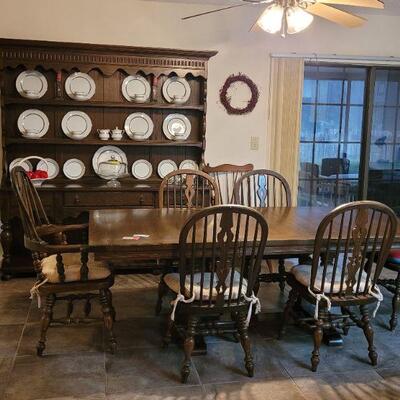 very nice dining room table and chairs, hutch sold separately. dishes are not for sale