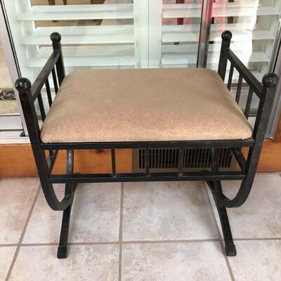 Wrought iron stool with tan fabric
20