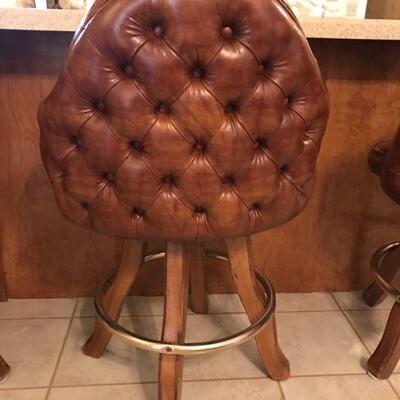 (3) brown leather bar stools | Swivel 360 degrees
23