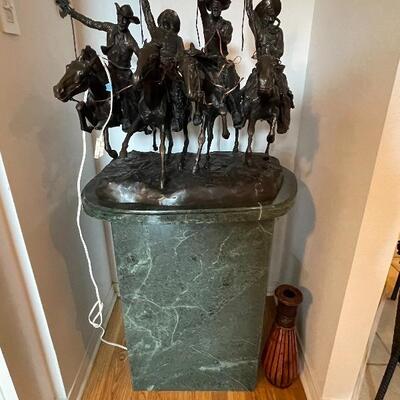 Coming Thru The Rye Remington w/Stand mounted on a pedestal


