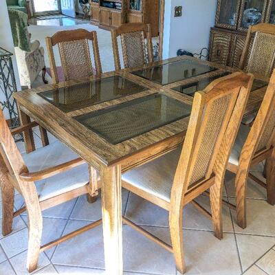 Wood Dining Room Table w/Beveled Glass and Cane Inserts includes (2)~18" Leaves & 6 Chairs ~ $165.00                       Table...