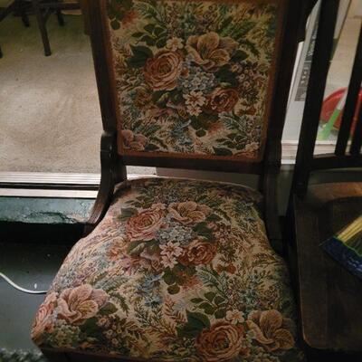 Tapestry like material on the old chair