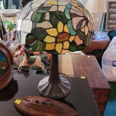 Another, smaller tiffany style lamp, has real stained glass