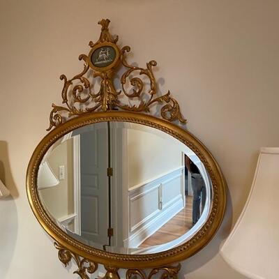Oval mirror 35 inches high and 29 inches wide 