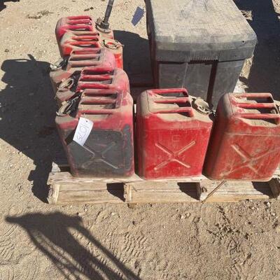 #1075 â€¢ 7 Jerry Can Gas Cans. 7 Red Jerry Cans. 
